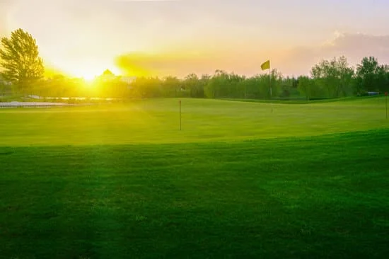 golf course during sunset 
